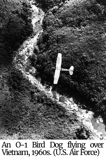 Photo of O-1 Bird Dog flying over Vietnam, 1960s.